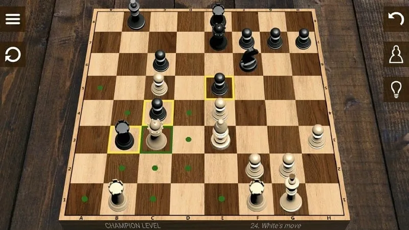 Close-up of a hand making a move on a digital chessboard.