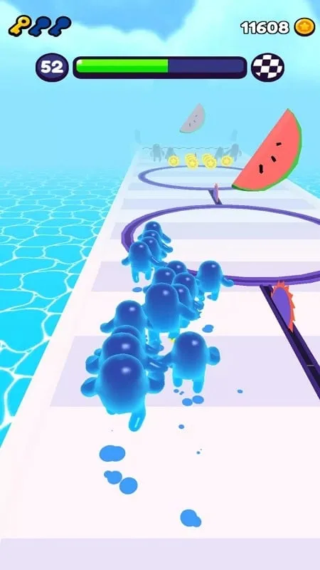 Large group of colorful blobs running toward a finish line.