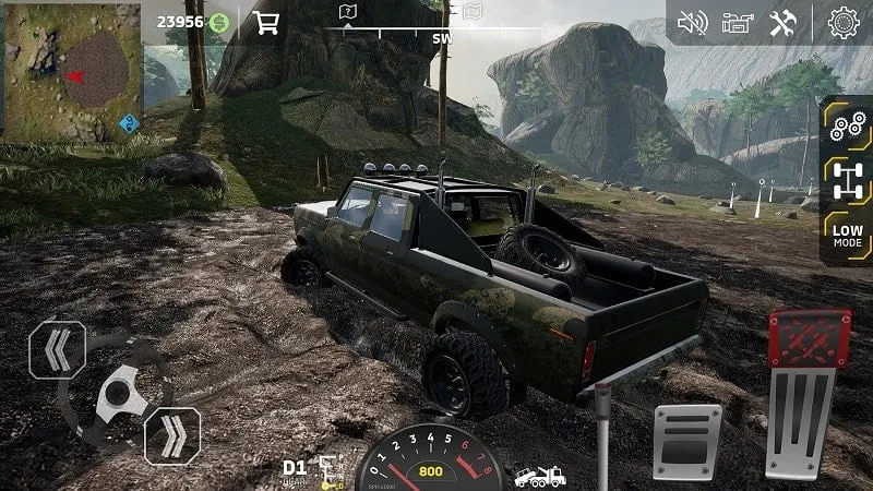 Tangkapan layar game Off Road MOD APK dengan tampilan mobil off-road di medan berat.